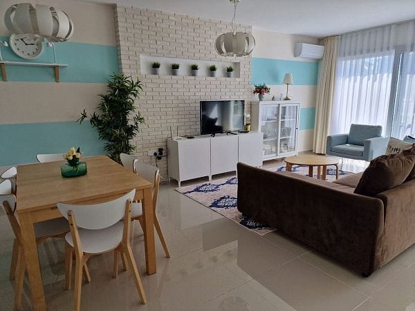 Современный 4-комнатный таунхаус 115 м² с террасой на крыше, расположенный на первой линии от моря - фото № 7